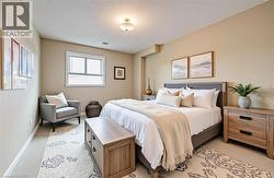 VIRTUALLY STAGED - Bedroom with light colored carpet and baseboards - 