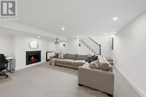 143 Avro Circle, Ottawa, ON - Indoor Photo Showing Living Room With Fireplace