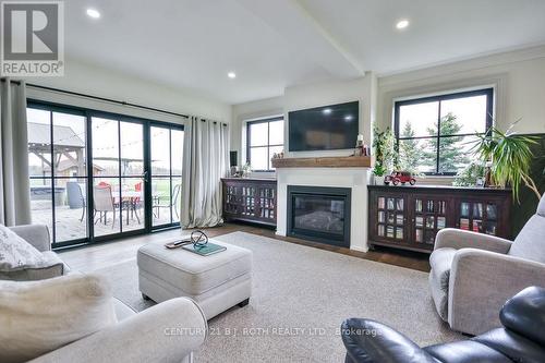 1803 Old Second Road N, Springwater, ON - Indoor Photo Showing Living Room With Fireplace