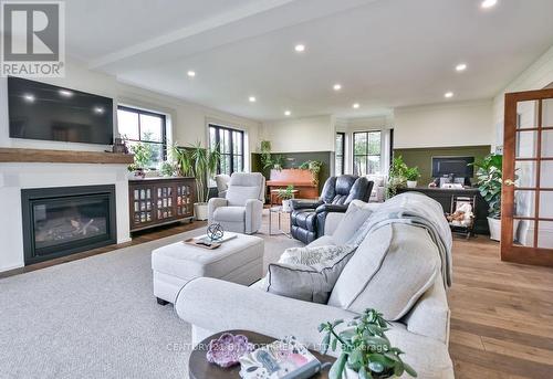 1803 Old Second Road N, Springwater, ON - Indoor Photo Showing Living Room With Fireplace