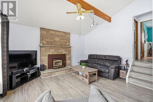 77 Tall Pines Drive, Tiny, ON - Indoor Photo Showing Living Room With Fireplace