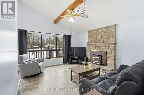 77 Tall Pines Drive, Tiny, ON - Indoor Photo Showing Living Room With Fireplace