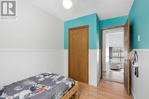 77 Tall Pines Drive, Tiny, ON - Indoor Photo Showing Bedroom
