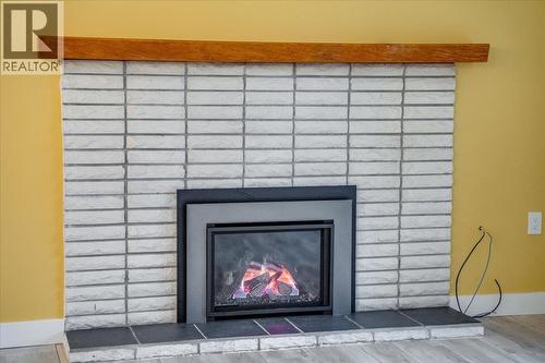 1408 Meadowbrook Drive, Castlegar, BC - Indoor Photo Showing Living Room With Fireplace