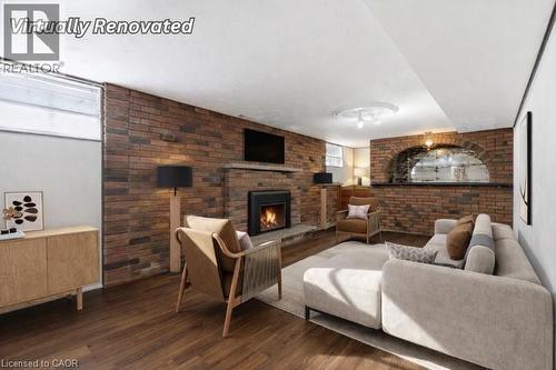 83 Riverdale Drive, Hamilton, ON - Indoor Photo Showing Living Room With Fireplace