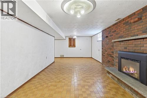 83 Riverdale Drive, Hamilton, ON - Indoor With Fireplace