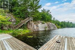 Stairs to top level, also path from lake up - 