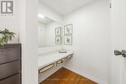 make up area with walk in closet - 