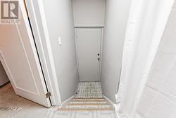 inside entry to garage 2 parking spaces - 