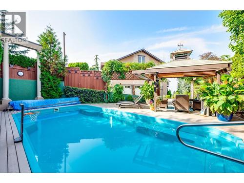 Great for entertaining friends - 375 Trumpeter Court, Kelowna, BC - Outdoor With In Ground Pool With Backyard