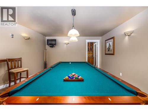 Pool table room, also can be a bedroom with window - 375 Trumpeter Court, Kelowna, BC - Indoor Photo Showing Other Room