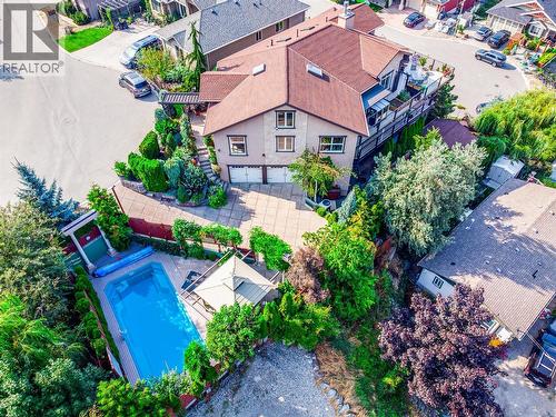 Your own Okanagan oasis - 375 Trumpeter Court, Kelowna, BC - Outdoor With In Ground Pool