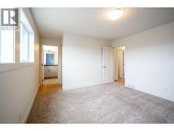 Primary bedroom looking towards ensuite bathroom - 