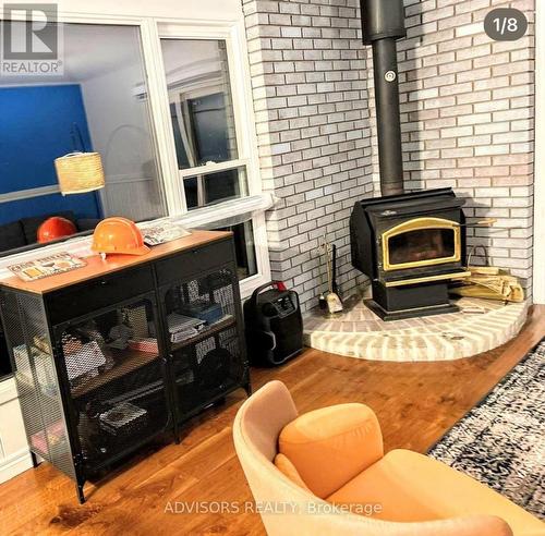 9 Bow Road, Tiny, ON - Indoor With Fireplace