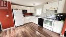 #14 Cypress Mobile Home Park, Maple Creek, SK  - Indoor Photo Showing Kitchen With Double Sink 