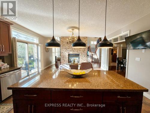 225 Terrace Wood Crescent, Kitchener, ON - Indoor Photo Showing Kitchen With Fireplace