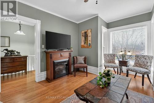 Upper Level - Primary BedRm (currently LivRm) - 287 Main Street E, Grimsby, ON - Indoor Photo Showing Living Room With Fireplace