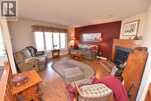 5600 Blackwell Sideroad Unit# 450, Sarnia, ON - Indoor Photo Showing Living Room With Fireplace
