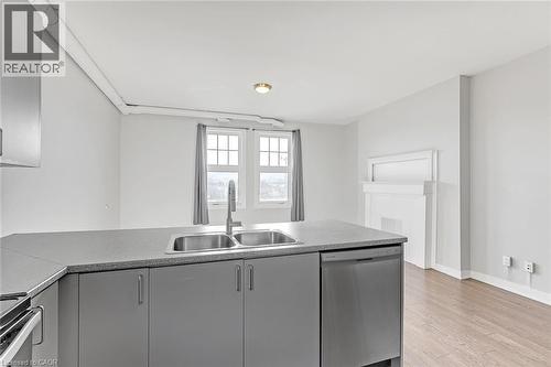 657 Barton Street E Unit# 302, Hamilton, ON - Indoor Photo Showing Kitchen With Double Sink