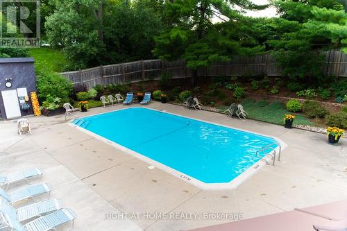 1516 - 2871 Richmond Road, Ottawa, ON - Outdoor With In Ground Pool With Backyard