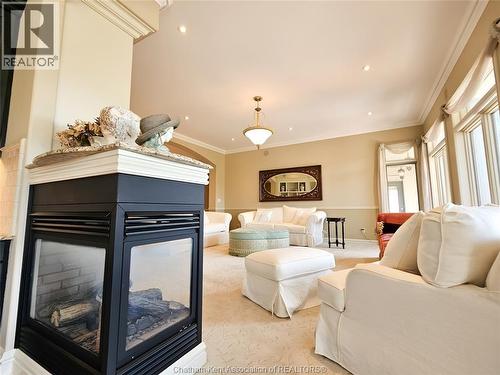 7635 Riverview Line, Chatham, ON - Indoor Photo Showing Living Room With Fireplace