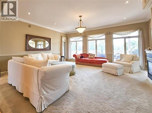 7635 Riverview Line, Chatham, ON - Indoor Photo Showing Living Room With Fireplace