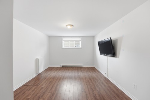 Salle familiale - 3998 Rue Mousseau, L'Assomption, QC - Indoor Photo Showing Other Room