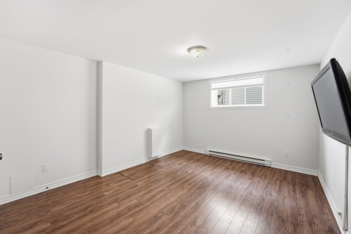 Salle familiale - 3998 Rue Mousseau, L'Assomption, QC - Indoor Photo Showing Other Room