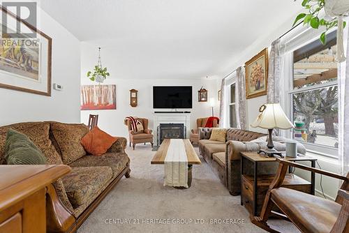 205 Keewatin Street, Oshawa (Donevan), ON - Indoor Photo Showing Living Room With Fireplace