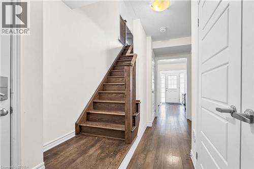 Stairway with hardwood / wood-style flooring and baseboards - 143 Ridge Road Unit# 48, Cambridge, ON - Indoor Photo Showing Other Room