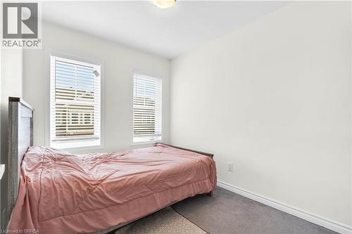Carpeted bedroom featuring baseboards - 143 Ridge Road Unit# 48, Cambridge, ON - Indoor Photo Showing Bedroom
