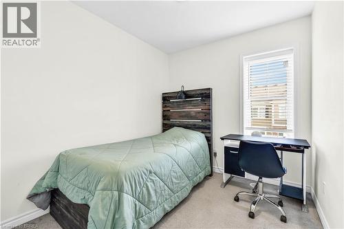 Bedroom featuring carpet flooring and an office area - 143 Ridge Road Unit# 48, Cambridge, ON - Indoor Photo Showing Bedroom