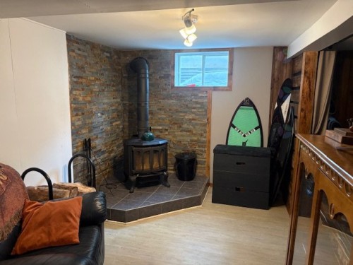 Salle familiale - 2458 Ch. Des Aubépines, La Conception, QC - Indoor Photo Showing Other Room With Fireplace