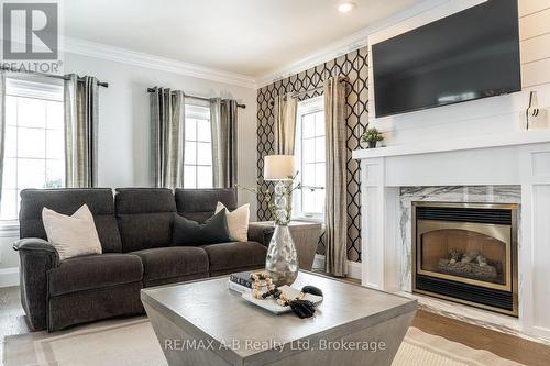 4609 Road 164, West Perth (Logan), ON - Indoor Photo Showing Living Room With Fireplace