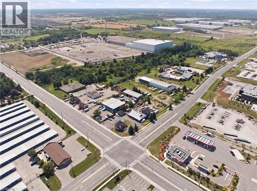 Aerial perspective showcasing a comprehensive commercial and industrial landscape - 1360 Rymal Road E, Hamilton, ON 