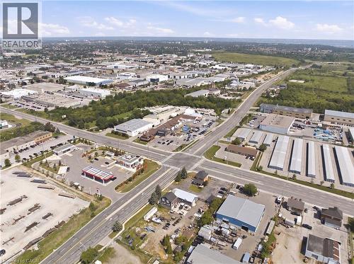 Aerial perspective showcasing an expansive commercial and industrial district - 1360 Rymal Road E, Hamilton, ON 