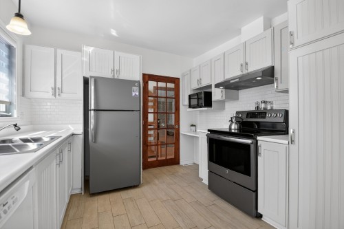 Cuisine - 71 45E Avenue, Saint-Eustache, QC - Indoor Photo Showing Kitchen With Double Sink