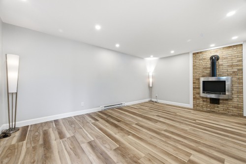 Salle familiale - 2118 Rue De Murcie, Laval (Vimont), QC - Indoor Photo Showing Other Room