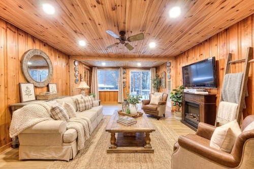 Salon - 3255 Route 327, Harrington, QC - Indoor Photo Showing Living Room With Fireplace