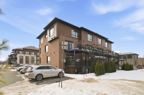 Face arrière - 4129 Rue Bernard-Hubert, Longueuil (Saint-Hubert), QC - Outdoor