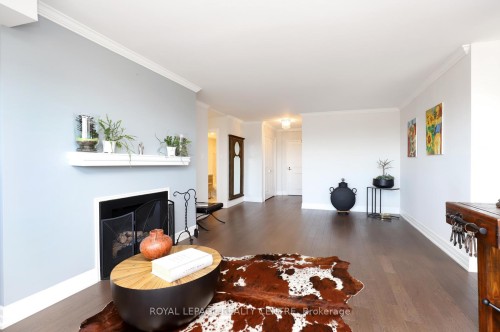 1607-1359 White Oaks Boulevard, Oakville, ON - Indoor Photo Showing Living Room With Fireplace