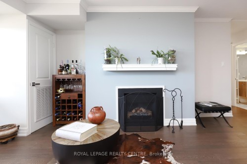 1607-1359 White Oaks Boulevard, Oakville, ON - Indoor Photo Showing Living Room With Fireplace