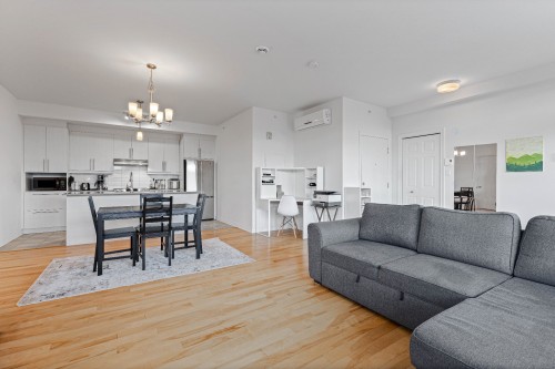 Overall view - 210-100 Rue Cartier, Saint-Lambert, QC - Indoor Photo Showing Living Room