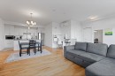 Overall view - 210-100 Rue Cartier, Saint-Lambert, QC  - Indoor Photo Showing Living Room 