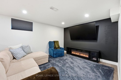 48 Champlain Avenue, Hamilton, ON - Indoor Photo Showing Other Room With Fireplace
