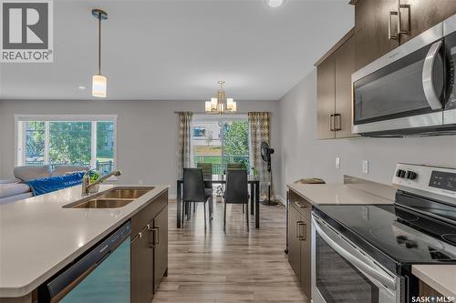131 315 Dickson Crescent, Saskatoon, SK - Indoor Photo Showing Kitchen With Double Sink With Upgraded Kitchen