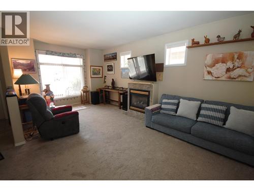 189 Willows Place, Oliver, BC - Indoor Photo Showing Living Room With Fireplace