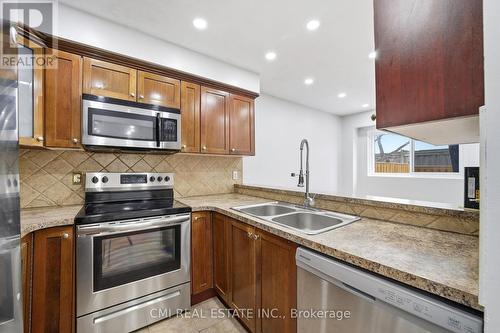 116 - 1538 Lancaster Drive, Oakville, ON - Indoor Photo Showing Kitchen With Double Sink