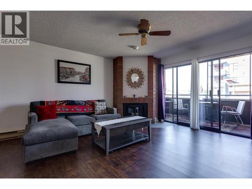 1490B Gordon Drive Unit# 206, Kelowna, BC - Indoor Photo Showing Living Room With Fireplace