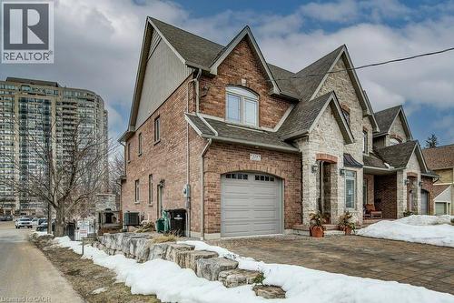 Double width driveway - 124 Allen Street E, Waterloo, ON - Outdoor With Facade